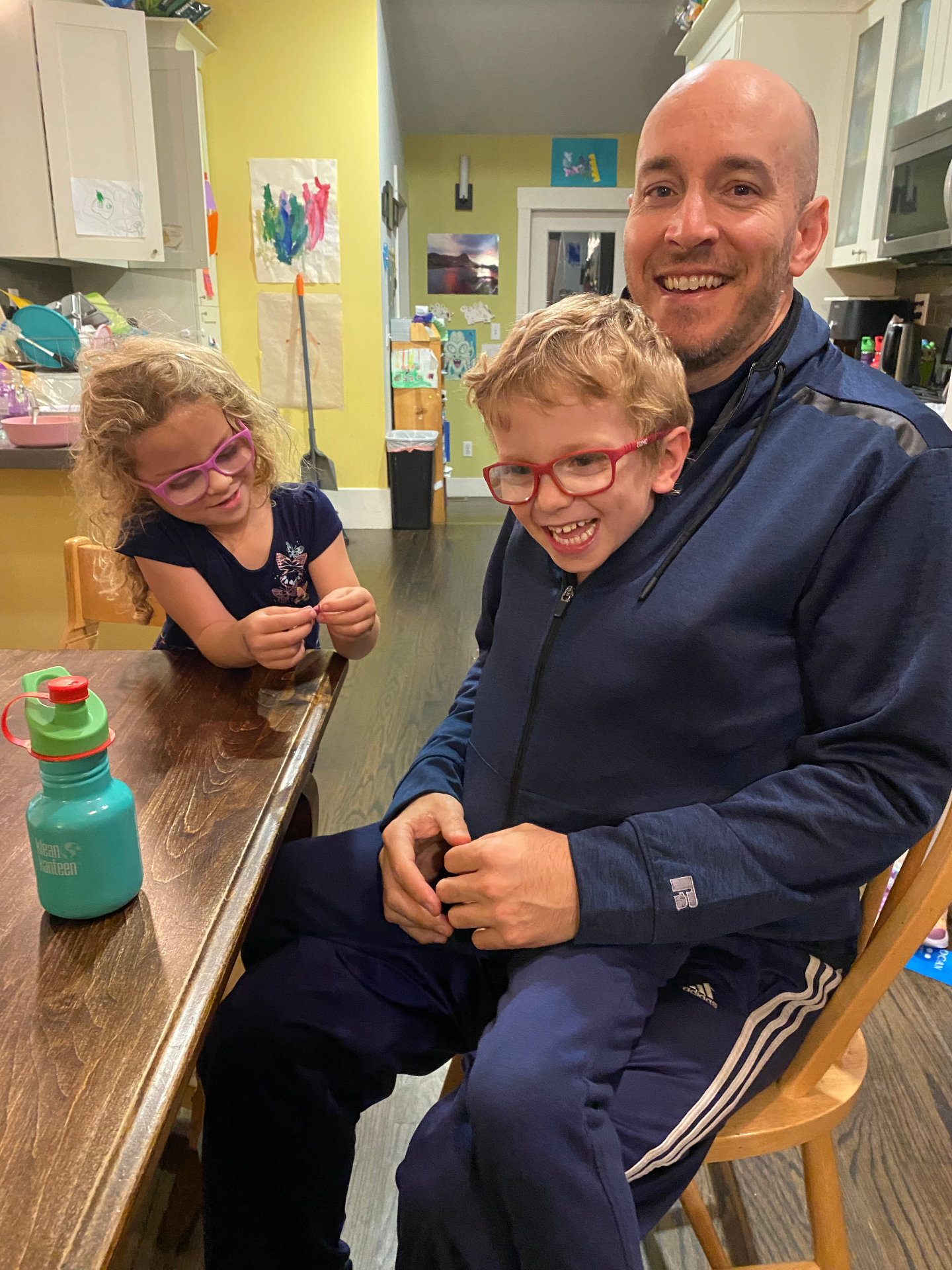 Cole with his children at home